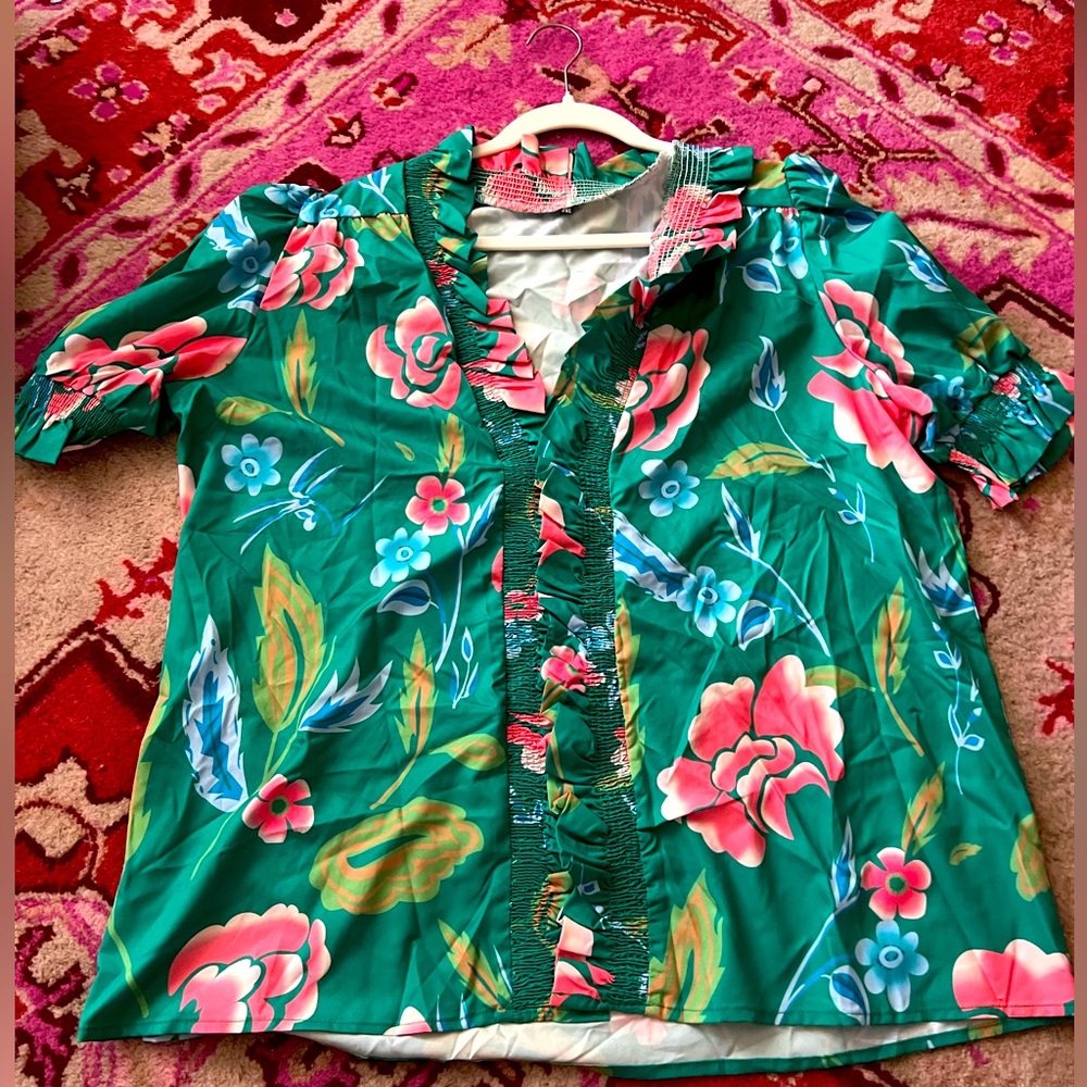 Ruffle hem floral blouse